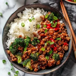 Firecracker Ground Chicken Bowls with colorful vegetables and rice