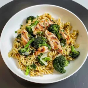 Rotisserie Chicken Broccoli Pasta dish with fresh ingredients and herbs