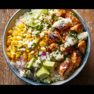 Delicious Street Corn Chicken Rice Bowl with vibrant toppings and grilled chicken.