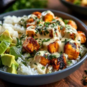 Delicious Easy Coconut Chicken Rice Bowl with tender chicken and coconut rice