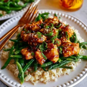 Honey Garlic Chicken served with vibrant green beans