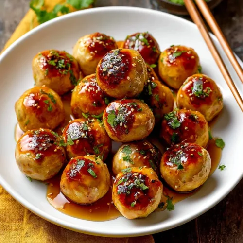 Delicious honey garlic chicken meatballs served on a plate